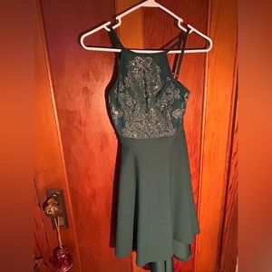 A green and silver special occasion dress